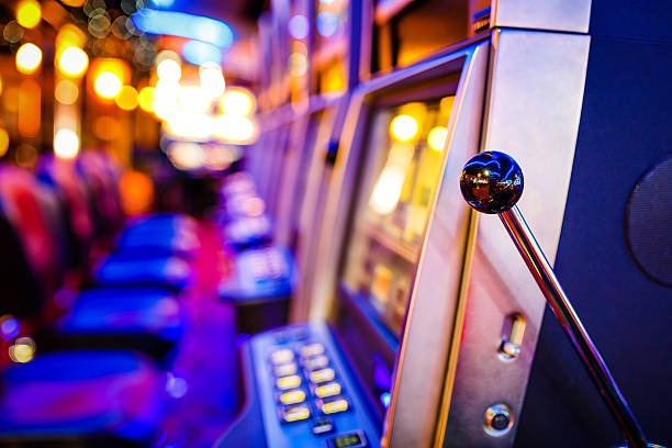 Mobile phone displaying live blackjack table with dealer and chat interface